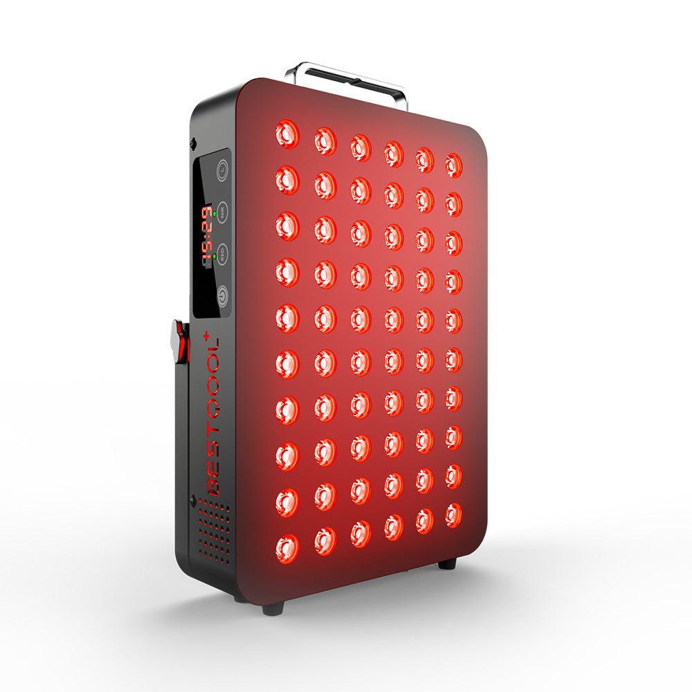 Man using BQ60 red light therapy device at bedside, showcasing red LED panel in use.