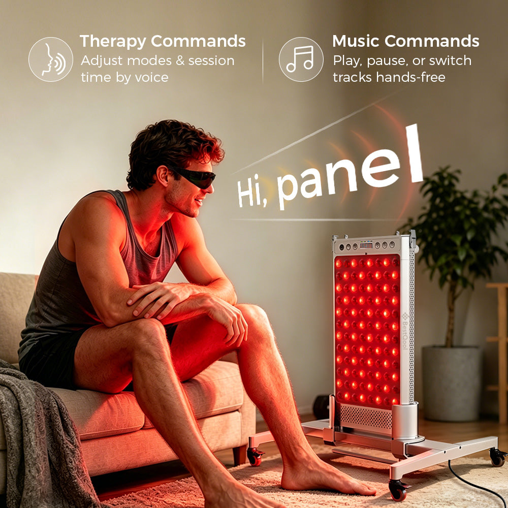 Man wearing goggles relaxing on a couch, using hands-free voice commands to control a BestQool waterproof sauna red light therapy panel on a wheeled stand.