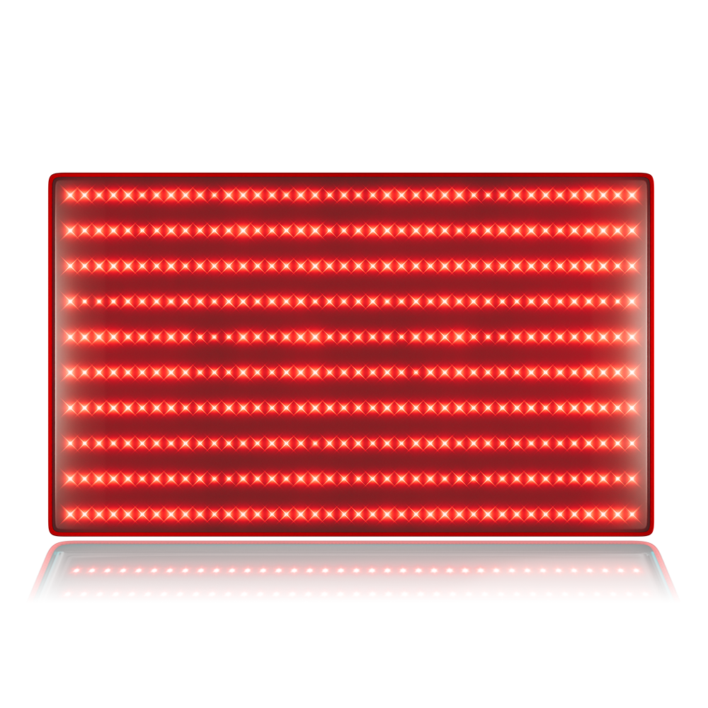Man relaxing on Red Light Therapy Mat with 300 LEDs for wellness